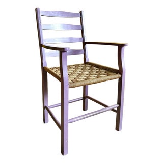 Danish Vintage Ladderback Armchair Featuring a Hand-Woven Rush For Sale