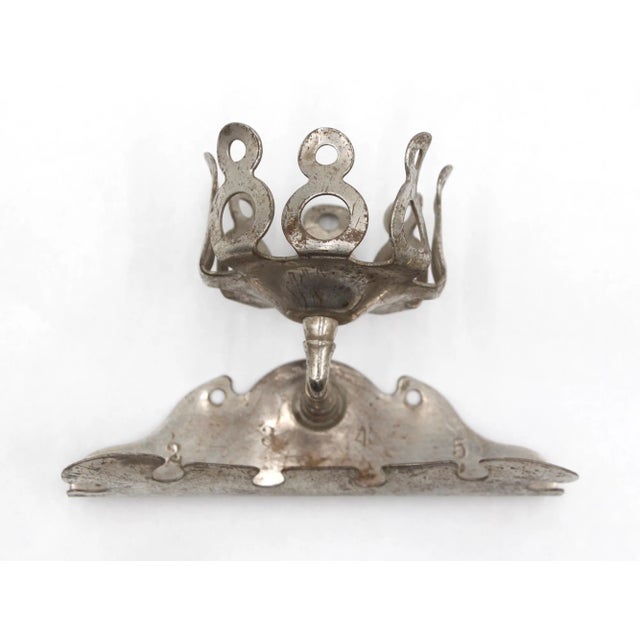 Antique surface mount wall bathroom toothbrush and cup holder made of brass with a nickel finish. It was made by...