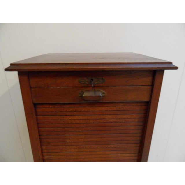 Antique Filing Cabinet with Roller Shutter, 1890s, in Very Good conditions. Designed 1890 to 1919