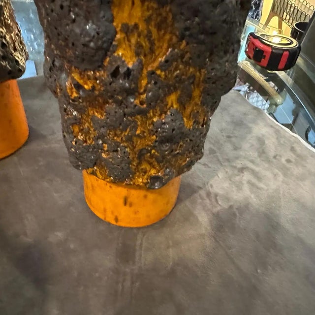 These three vases are striking examples of the Fat Lava ceramic style from the 1980s. Fat Lava ceramics, originating...