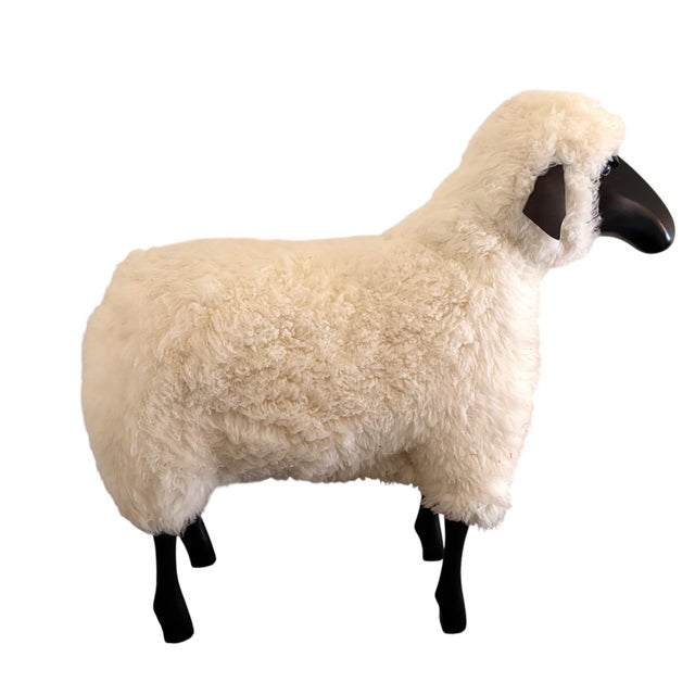 Equal parts iconic and adorable, this large life-sized Lalanne-style sheep is made of black wood, with leather ears and...