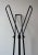 Metal coat rack consisting of 3 coat hooks, 6 hooks and umbrella holder. Triangular base. Solid and robust, combining...