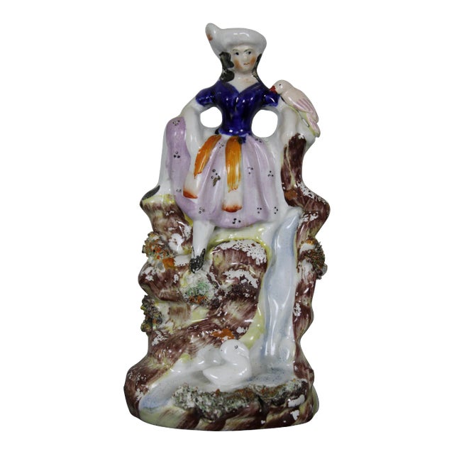 Antique Late 19th Century English Staffordshire Porcelain Figurine Girl Seated on Waterfall Bird For Sale