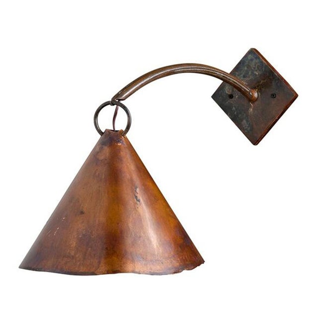 The copper cone sconce is a great fixture for accent lighting. The sconce is handcrafted in copper and dipped in an acid...
