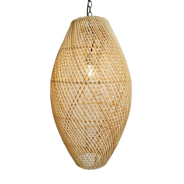 Charming natural rattan bead shaped hand woven pendant light. Great displayed in groupings or on its own and will look...