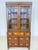 Perfectly suited to classic English colonial style, this beautiful, two-part campaign display cabinet is for sale. The...