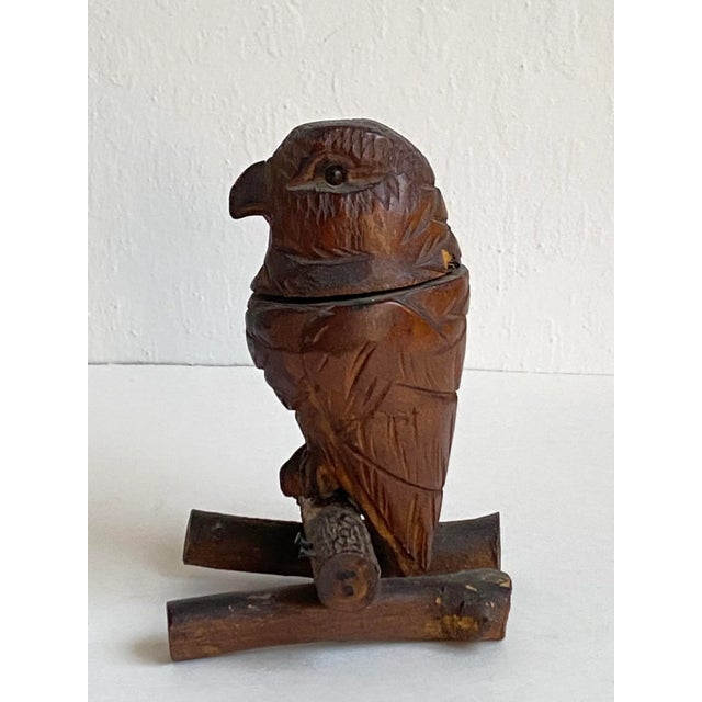 Delightfully whimsical carved wood folk art bird. It’s head is hinged to reveal a tiny compartment in which to store small...