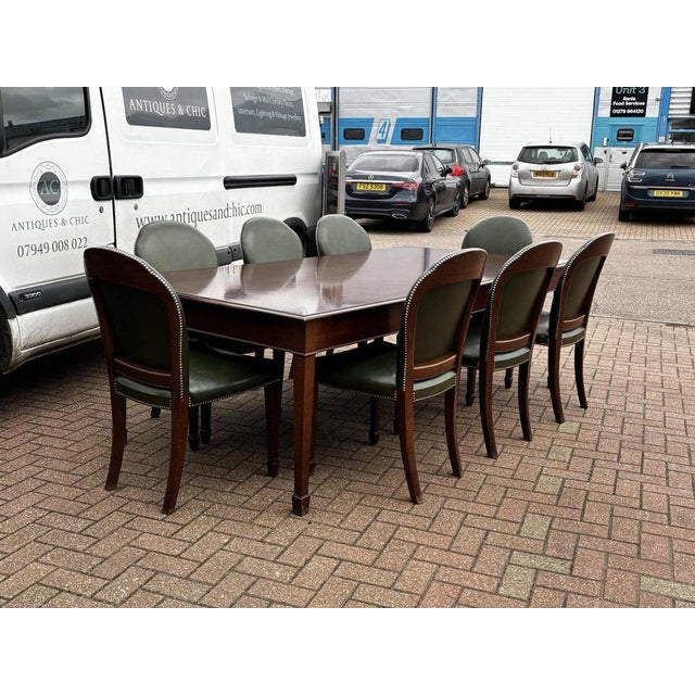 Dining Table & 8 Green Leather Dining Chairs. Table Sizes :- 240 x 120 cms, 77 cms tall. Chair sizes :- 98 cms tall, 54...