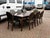 Dining Table & 8 Green Leather Dining Chairs. Table Sizes :- 240 x 120 cms, 77 cms tall. Chair sizes :- 98 cms tall, 54...