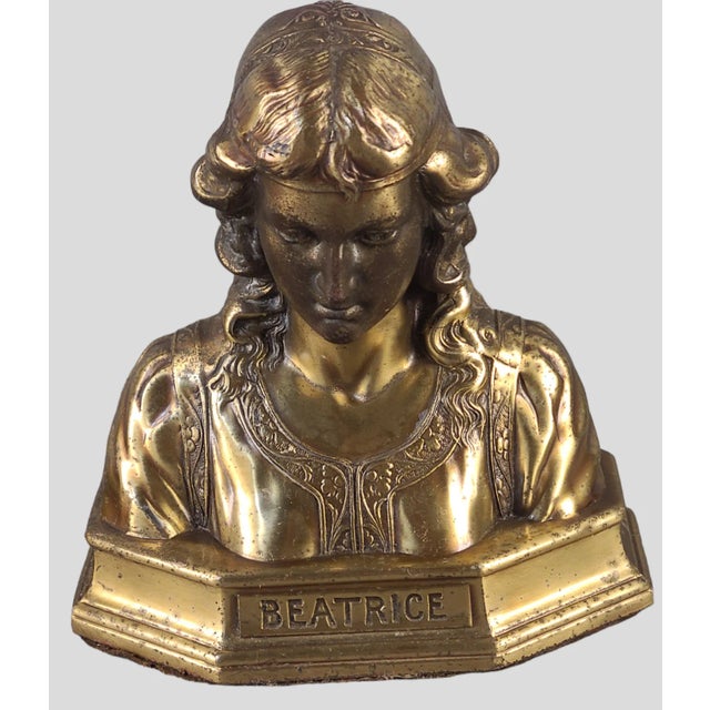 We are pleased to be offering this antique pair of gilded bronze or brass clad bookends depicting Dante & Beatrice in good...