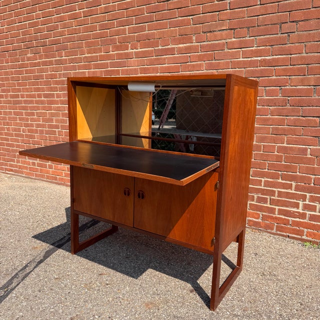 Designed by Arne Wahl-Iversen for IKEA 1960s, the “Varié” bar cabinet is a clever example of Danish modern design that...
