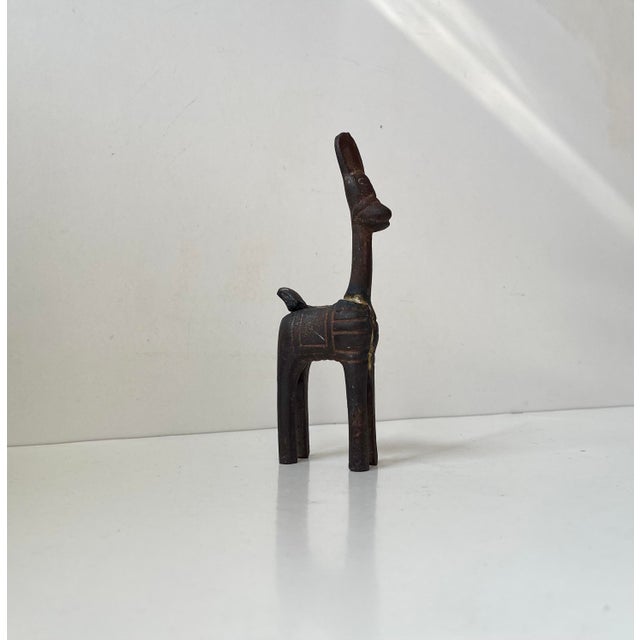 An artisan made Bankura horse figurine or small sculpture in cast iron. It was made in Bankura in West Bengal India circa...