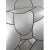 A stylized David Bowie in a piece of aluminum. His contours were created by cutting out his Silhouette in the material....