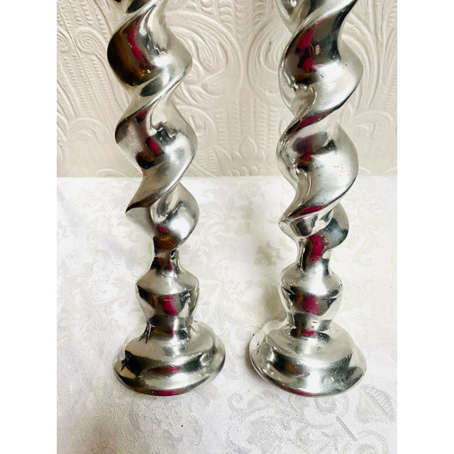 A pair of beautiful vintage twisted silver candle holders, hand made in Mexico, just waiting to decorate your table!