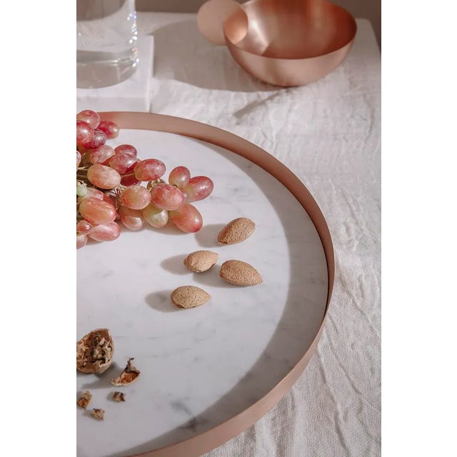 Full Moon, a small copper tray with a Carrara marble top, is part of Lunar Landscape designed by Elisa Ossino for Paola C....