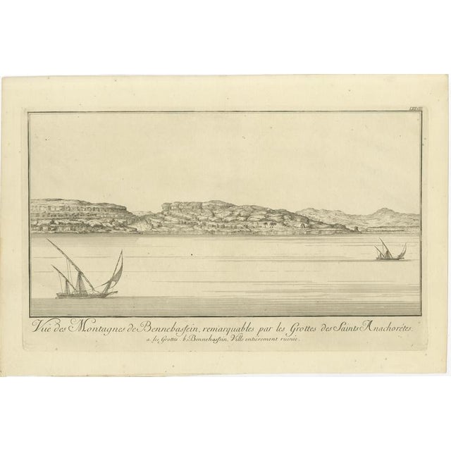 Mountains of Bennehassein and Hermit Grottos – Nile Engraving, c.1755 This panoramic plate shows the mountains of...