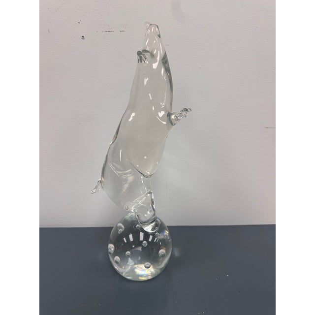 A really fun vintage Murano glass sculpture depicting a pig standing proudly on a clear bubble-filled glass sphere. Hand-...