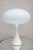 A modernist table lamp by Laurel. Enameled metal and frosted glass shade.