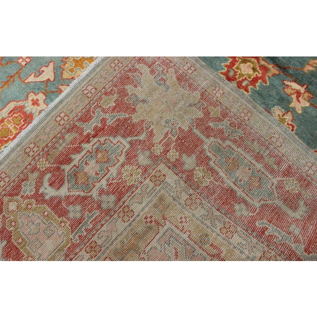 Antique Turkish Oushak Rug on a Blue Background and Orange-Red Color Border For Sale - Image 12 of 12