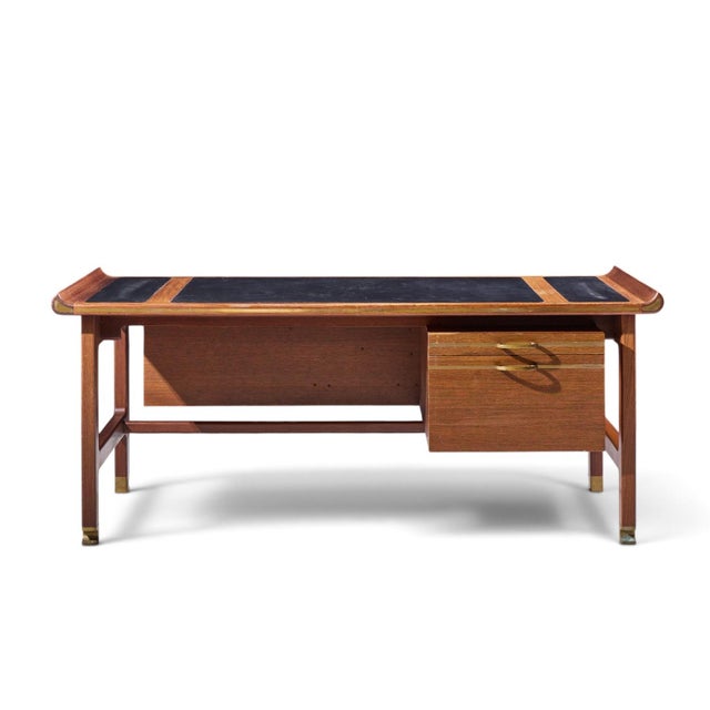 Kofod Larsen for Selig Megiddo Queen of Sheba African Wenge Wood and Brass Executive Desk This desk measures: 70.75 wide x...