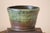 This is a gorgeous pottery planter in Raku style that can be used indoor or out. Each side of this planter has a different...