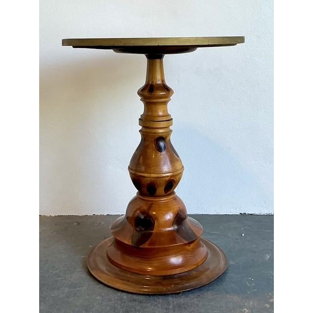 This extraordinary vintage pedestal table is a true collector’s piece, blending mid-century sculptural form with the...