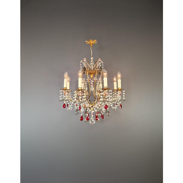 Magnificent Restored Chandelier with Red Crystals – A Timeless Masterpiece This stunning chandelier has been completely...