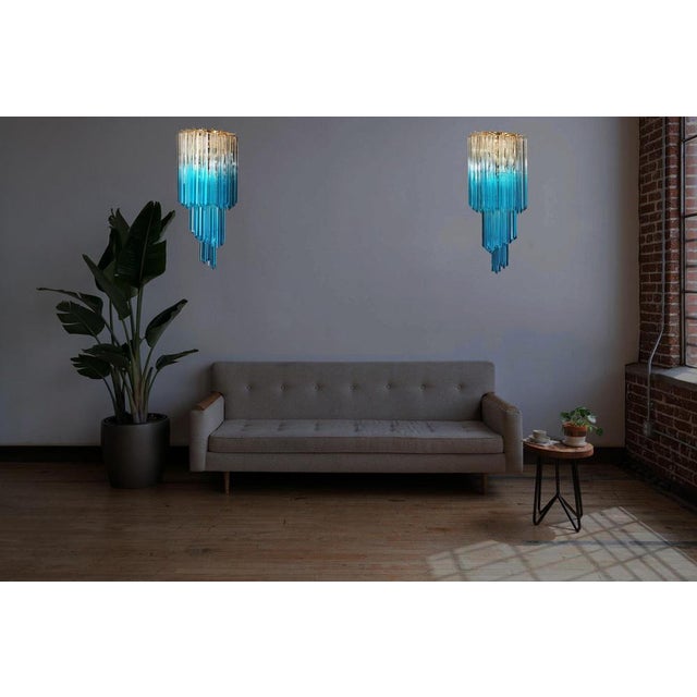 Fantastic pair of vintage Murano wall sconce made by 16 Murano crystal prism (quadriedri) for each sconce in a gold metal...