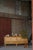 A charming low-profile sideboard crafted in oak and designed in the style of Henning Kjærnulf, Denmark, 1960s. The piece...