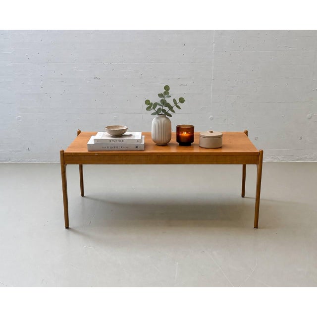 Elegant Scandinavian coffee table in the style of Severin Hansen, featuring a clean, timeless design. The finely...