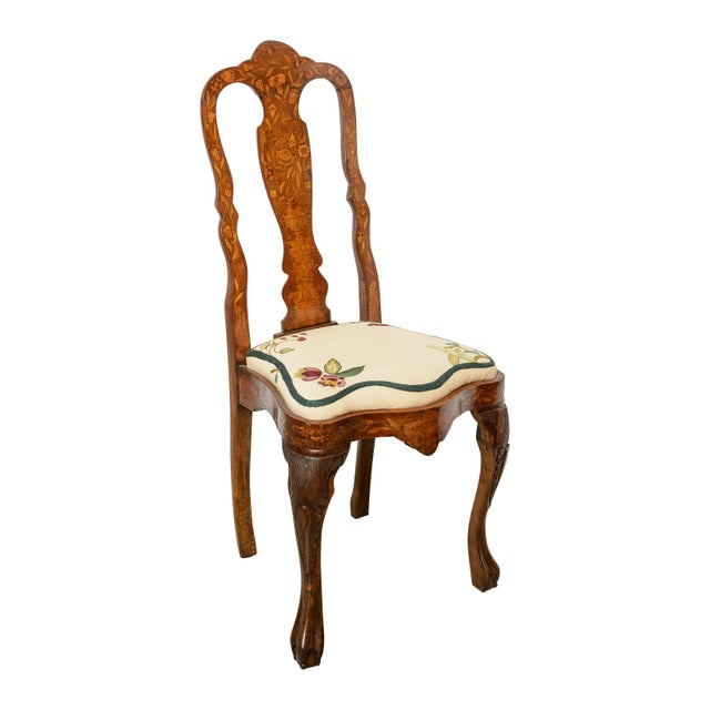 Pair of Dutch inlay side chairs with upholstered seats and wood inlay. Traditional inlay in the shaped back splat and the...