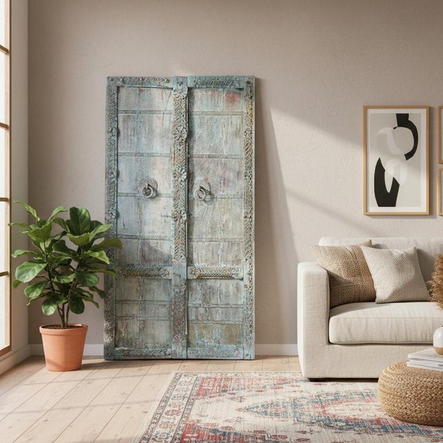 Dimensions: 38" W X 3" D X 72" H Features: • 100% solid teak wood • Antique door from India • Entirely handmade by expert...