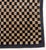 Tibetan Black and Tan Checkered Prayer Rug. 3' L x 2' 9" W. Provenance: From the Estate of Joseph Lawrence Gardella.