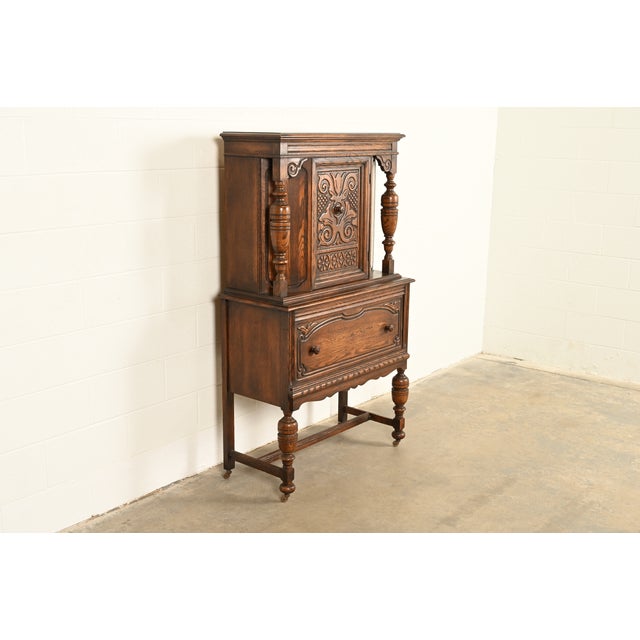 Victorian Bernhardt Furniture Antique English Jacobean Carved Oak Bar Cabinet, Circa 1930s For Sale - Image 3 of 16