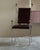 A pair of chairs created by designer-sculptor Felix Agostini in 1969, France. The frame is made of hammered chromed iron,...