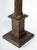 Carved and gilded wood candle stick, 19th century Measures: H: 68 cm, W: 18 cm, D: 18 cm.
