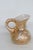 This lovely Pocono Crest Miniature Pitcher is made of ceramic. This dainty collectible features a gorgeous "Weeping Gold"...