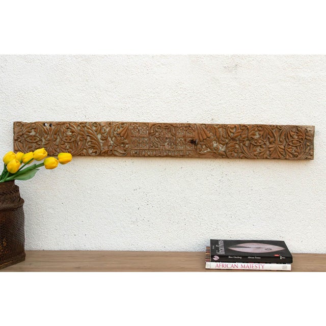 The Geometric Frieze is a study in architectural rhythm and historical texture. Hand-carved from a substantial plank of...