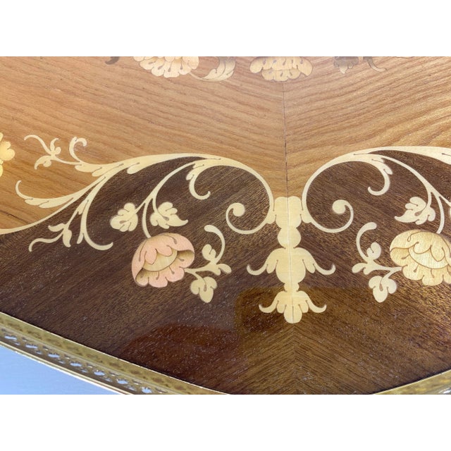 This is a mid century Italian Florentine style inlaid galley tray. This brown mahogany tray is inlaid with a floral design...