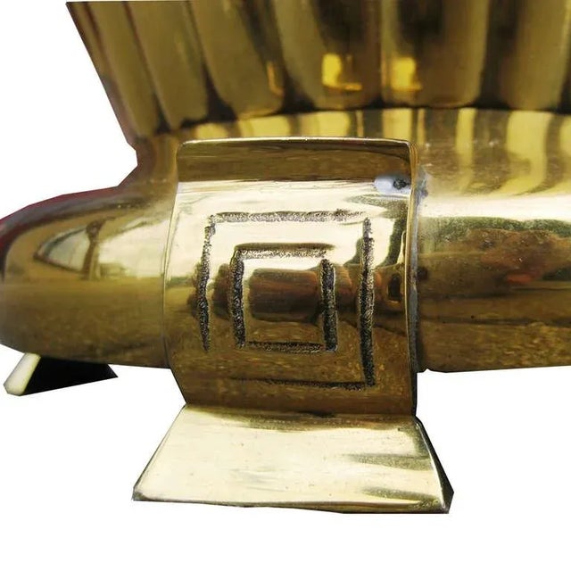 A vintage midcentury table lamp by Marbro, this piece is heavily ribbed and made of polished brass. Beneath the...