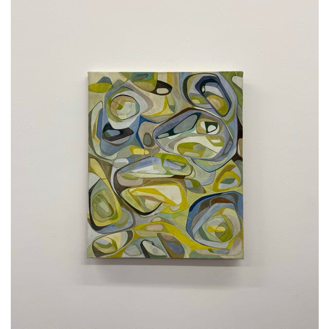 A contemporary abstract painting featuring layered biomorphic forms in soft blue, sage, olive, cream, and warm taupe...