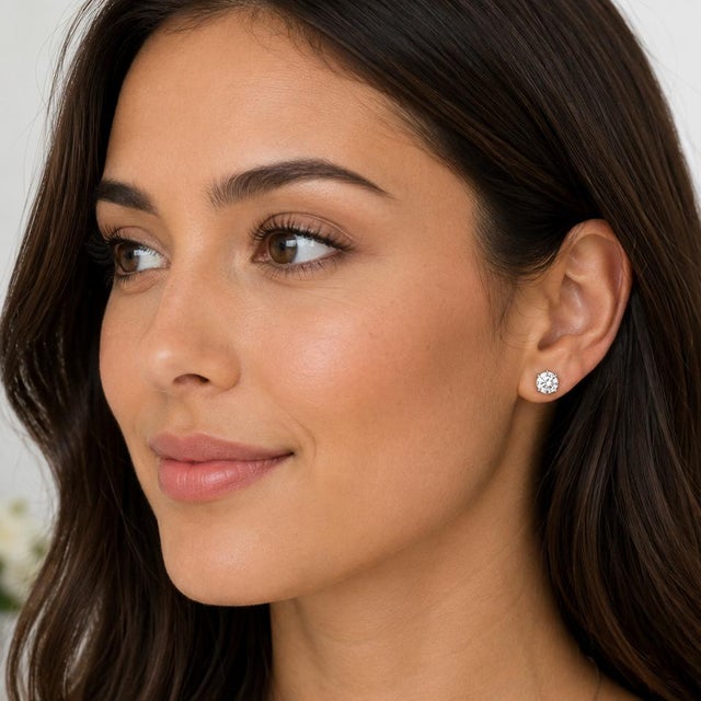 18k white gold 3.00 carat total weight stud earrings with 1.515 carat I SI2 and 1.486 carat I I1 round brilliant diamonds