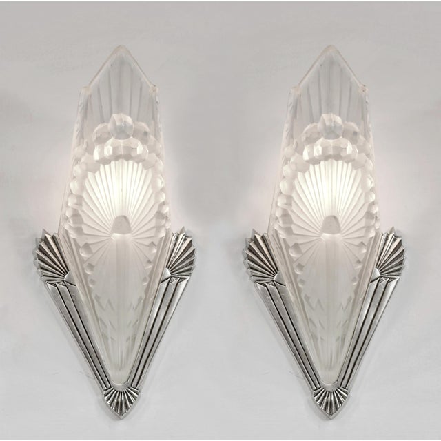 Charles Schneider A wonderful pair of French art deco wall sconces made around 1925-1935. The nickel plated solid brass...