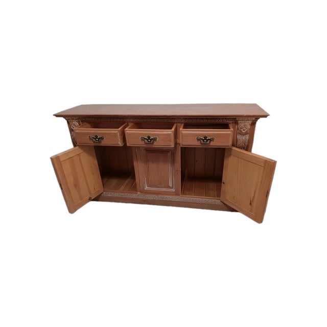 This Vintage American Traditional Wood Sideboard Buffet Credenza is a charming piece of furniture with 3 drawers and 3...