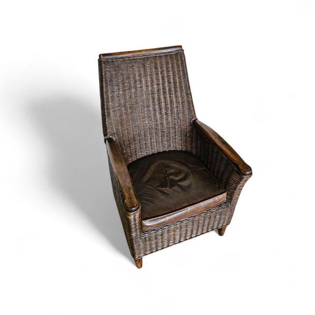 Rattan arm chair 1960S / wooden armrests / leather seat Rattan arm chair 1960S / wooden armrests / leather seat Width...