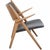 Hans wegner ch28 sawback lounge chair with a frame of oak and black leather upholstery. The chair is from the 1960s and...