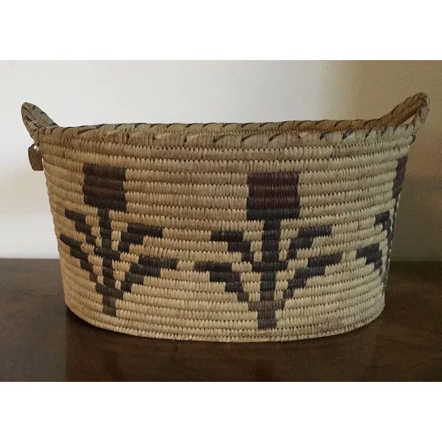 Mid 20th Century Native American Papago Oval Basket with Two Handles and Flower Decoration For Sale - Image 5 of 11