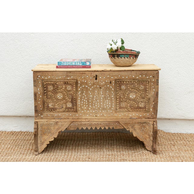 This extraordinary Levantine bleached wood chest, adorned with intricate mother-of-pearl inlay, whispers tales of a rich...