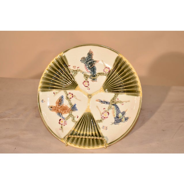 19th Century majolica bird and fan pattern plate from England. There is an impressed WEDGWOOD mark on the back of the...