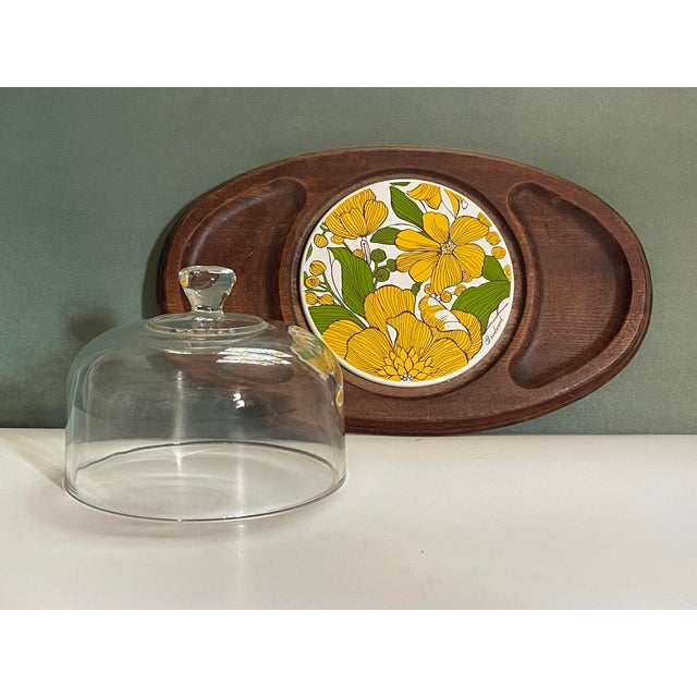 A beautiful mid 20th century appetizer board with fitted glass dome and a nature inspired green & yellow mod floral...